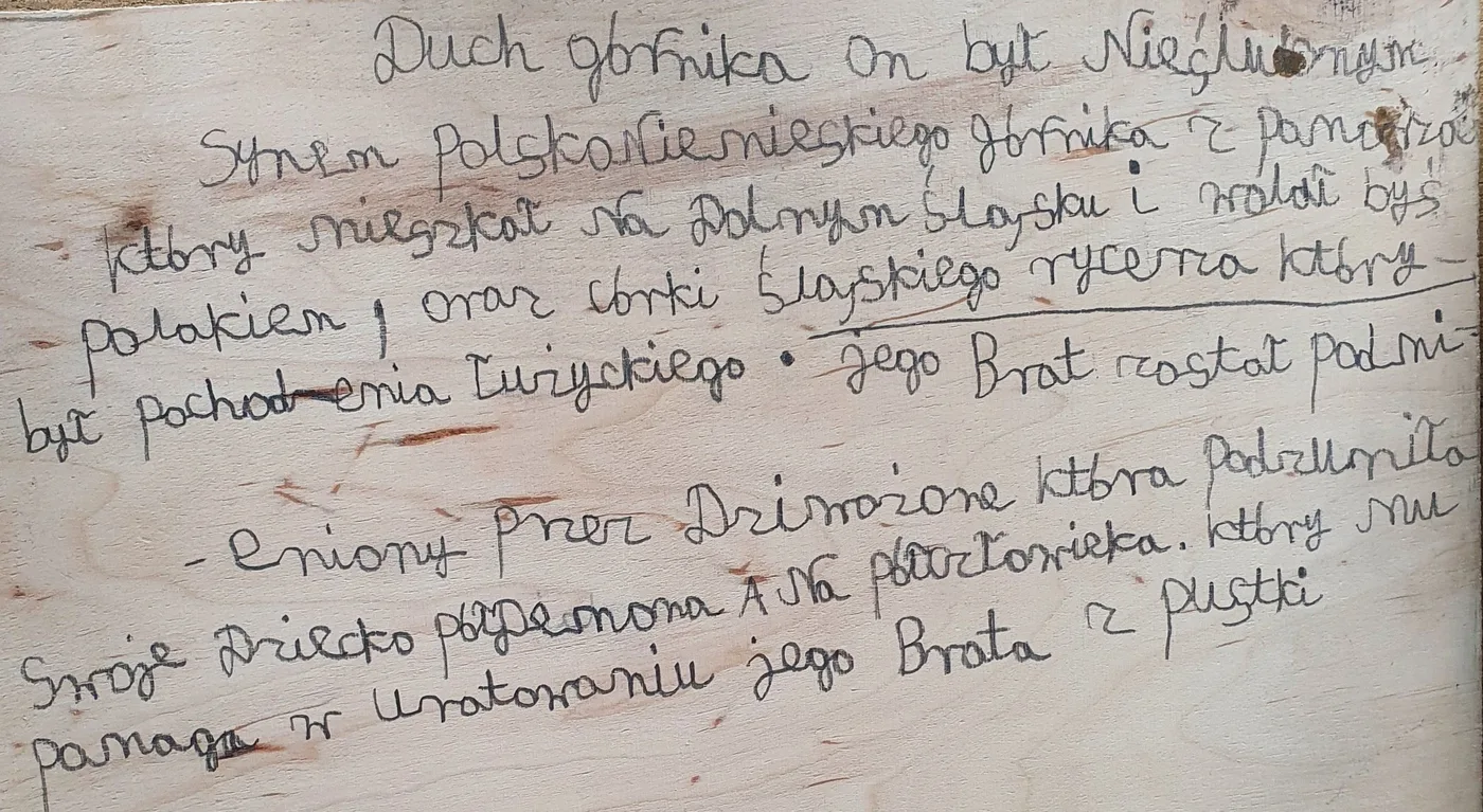 Odręczny opis Ducha Górnika na odwrocie deski